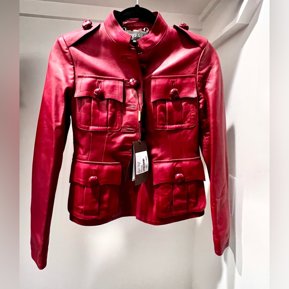 Maroon leather jacket from Gucci. Never worn, tags on.